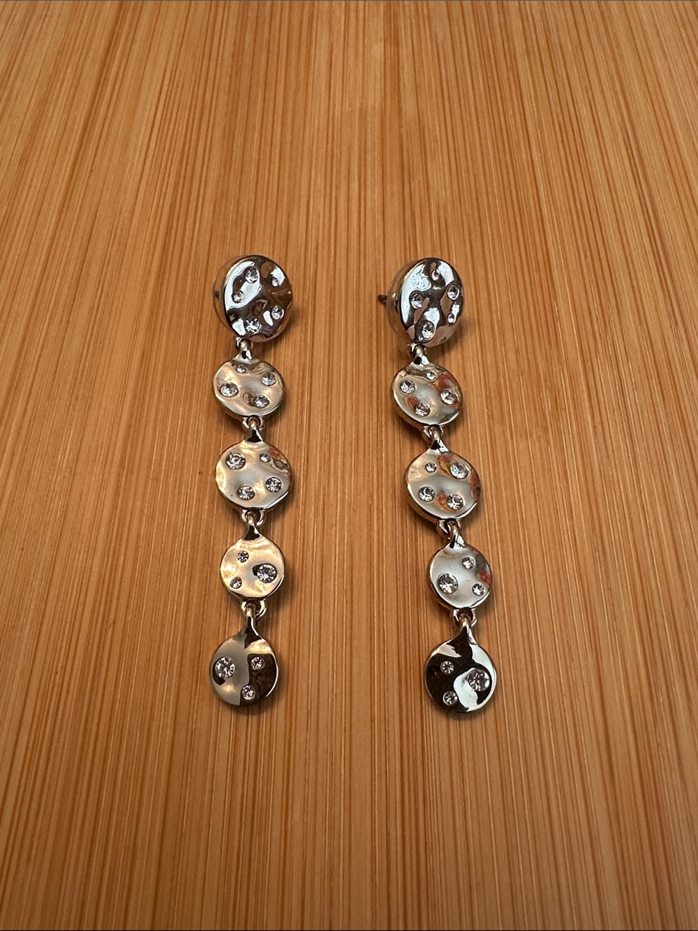 Gold Tone Hammered Disc Drop Earrings with Crystal Accents